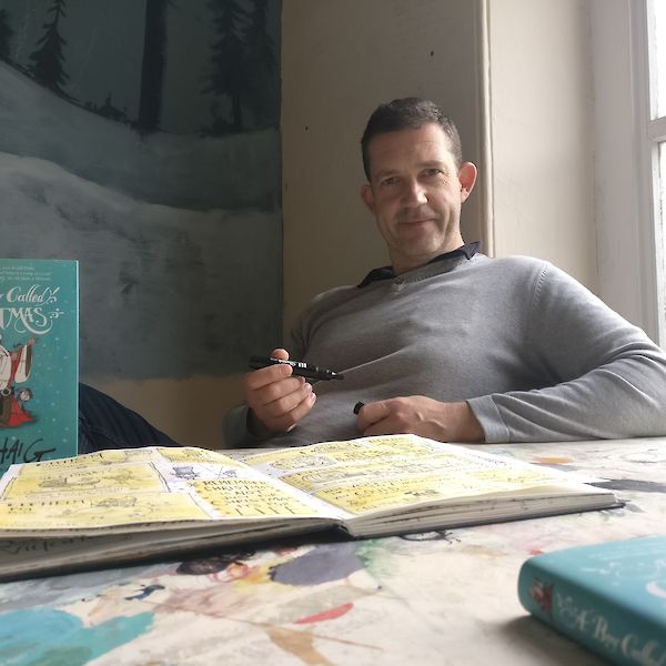 Chris Mould, the illustrator of A Boy Called Christmas, in his studio