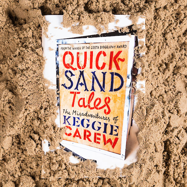 Quicksand Tales in sand photo