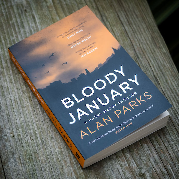 Bloody January by Alan Parks - paperback photograph